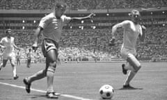 England captain Bobby Moore gets ready to block Jairzinho’s cross.