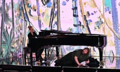 Kate Golla on piano and Allan Clayton (tenor) beneath it, with Fred Williams’ artwork behind, at London’s Barbican.