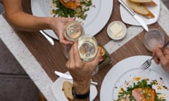 Couple proposing toast with wine glasses at dinner table, elevated view<br>B284NN Couple proposing toast with wine glasses at dinner table, elevated view