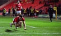 The scrum-half Gareth Davies scores a try