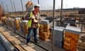 A young brickie on a building site. 