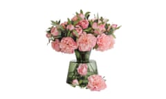 A vase of fake pink peonies