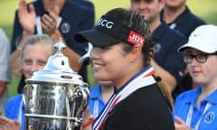 Ariya Jutanugarn celebrates with the US Open trophy after her playoff victory.