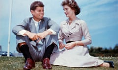 Jack Kennedy and Jacqueline Bouvier<br>John F. Kennedy and Jacqueline Bouvier sit together in the sunshine at Kennedy's family home at Hyannis Port, Massachusetts, a few months before their wedding.