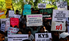 India Media Police Raids<br>Activists of various student organizations hold placards in a protest against the raids of homes of journalists and writers belonging a news portal in New Delhi, India on October 04, 2023. Indian Police officials raided the homes of journalists and writers belonging to a news portal known as NewsClick.in on Tuesday . (Photo by Kabir Jhangiani/NurPhoto via Getty Images)