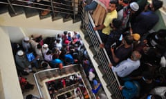 Thousands of people queue at a mass vaccination programme in Bangladesh in February.