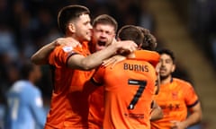 Cameron Burgess celebrates with teammates after he put Ipswich back in front at the CBS Arena.