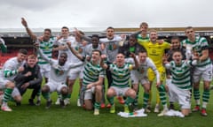 Celtic players celebrate winning last season’s Scottish Premiership, their eight consecutive league title.