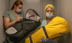 Nurses from Biotexcom picking newborns up whom will be delivered to foreign couples.