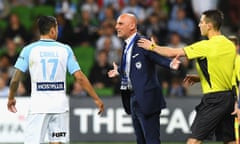 Tim Cahill and Kevin Muscat exchange words