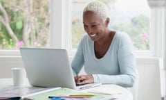 A woman browsing on a laptop