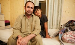 Afghan refugees Said Ghullam Norzai and his son Wali Khan, 10