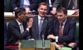 Prime Minister Rishi Sunak congratulates Chancellor of the Exchequer Jeremy Hunt after he delivered his autumn statement to MPs in the House of Commons.