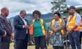 PPapua New Guinea's prime minister, James Marape, (second left) talking with officials at the site of a landslide at Yambali village on Friday.