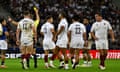 Tumua Manu (second right) is shown the yellow card by the referee, Andrew Brace