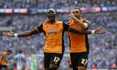 Mohamed Diamé celebrates with Hull team-mate Ahmed Elmohamady