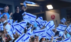 Israel fans wave the national flag during the Euro Under-21 Championship in the summer