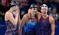 The United States' Claire Weinstein, from left, Katie Ledecky and Paige Madden react as they win the silver medal in the women's 4x200-meter freestyle relay on Tuesday night.