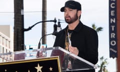 FILES-US-POLITICS-VOTE<br>(FILES) US rapper Eminem speaks for Curtis Jackson during the ceremony honoring Curtis "50 Cent" Jackson with a Star on The Hollywood Walk of Fame in Hollywood, California on January 30, 2020. Rap star Eminem has formally asked Republican presidential hopeful Vivek Ramaswamy to stop using his music on the campaign trail, according to a letter made public on August 28, 2023. (Photo by Mark RALSTON / AFP) (Photo by MARK RALSTON/AFP via Getty Images)