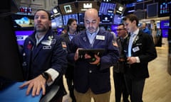 Traders work on the floor of the New York Stock Exchange