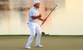 Bryson DeChambeau celebrates after holing his putt on the 18th for victory.