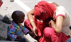 Dehradun, Uttarakhand/India - August 01 2020:Poor Indian women with her child.<br>2CFE7HF Dehradun, Uttarakhand/India - August 01 2020:Poor Indian women with her child.