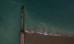 Heavy Rainfall Has Led To Water Companies Releasing Raw Sewage Into Waterways Around The UK<br>SEAFORD, ENGLAND - AUGUST 17: A jetty beneath which raw sewage had been reportedly been discharged after heavy rain on August 17, 2022 in Seaford, England. The Environment Agency has issued pollution alerts across the UK after recent heavy rainfall and flooding have affected water quality. Sewers overflow into the sea and rivers when treatment plants are overwhelmed by torrential rain otherwise it would spill into streets or back up into toilets. Environmental campaign group Surfers Against Sewage reported that raw sewage had been released into the waters at beaches in Sussex, Cornwall, Devon, Essex, Lancashire, Lincolnshire, Northumberland and Cumbria. (Photo by Dan Kitwood/Getty Images)