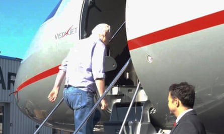 Screenshot from the video of Julian Assange boarding a flight at London Stansted airport.