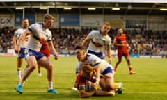 Catalans Dragons’ Adam Keighran scores the opening try.