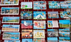 Traditional postcards on a stand in Cornwall.