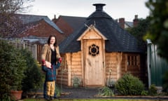 Kathryn Minchew with her young son by her shed.