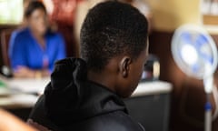 A rear view of  a 17-year old boy at a rehab session at  the City of Rest centre in Freetown, Sierra Leone.