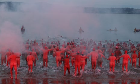 A record 3,000 people join nude Dark Mofo swim for winter solstice – video