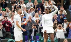 Jamie Murray and Venus Williams take in the applause after their victory in the mixed doubles