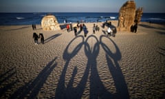 Olympic rings cast a shadow