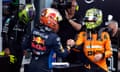 Max Verstappen (centre) shakes hands with McLaren's Lando Norris after a fierce battle in Barcelona.