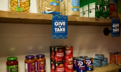 A sign on the shelf in Leeds Beckett University's new food bank reads 'Give or Take'