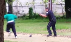 Walter Scott, left, appears to run away from officer Michael Slager, right, in video that appears to show him shooting Scott several times in the back.
