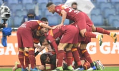 Roma’s Gianluca Mancini celebrates with his teammates after scoring his late equaliser against Inter