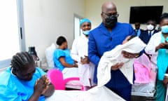 President Félix Tshisekedi launches a free maternity care programme at a hospital in Kinshasa, Democratic Republic of Congo, in September. The scheme is aimed at reducing maternal and infant mortality.