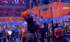 Just Stop Oil protesters holding an orange banner disrupt the Proms.