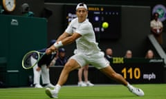 Ryan Peniston races to return the ball against Andy Murray on Centre Court