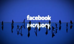 Illustration made with figurines set up in front of Facebook's homepage