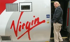 Richard Branson boards a Virgin train