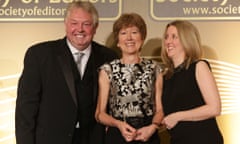 Sarah Boseley poses with press award with Nick Ferrari and a unnamed woman.