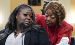 Wandrea "Shaye" Moss, a former Georgia election worker, is comforted by her mother Ruby Freeman, right, as the House select committee investigating the Jan. 6 attack on the U.S. Capitol continues to reveal its findings of a year-long investigation, at the Capitol in Washington, Tuesday, June 21, 2022. (AP Photo/Jacquelyn Martin)