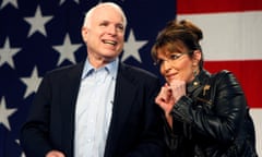 FILE PHOTO - U.S. Senator John McCain and former Alaska Governor and vice presidential candidate Palin acknowledge crowd during a campaign rally for McCain at the Pima County Fairgrounds in Tucson<br>FILE PHOTO - U.S. Senator John McCain (R-AZ) and former Alaska Governor and vice presidential candidate Sarah Palin acknowledge the crowd during a campaign rally for McCain at the Pima County Fairgrounds in Tucson, Arizona March 26, 2010. REUTERS/Joshua Lott/File Photo