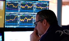 A trader reacts on the floor of the New York Stock Exchange at the closing bell on 30 December 2022