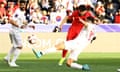 South Korea's Lee Kang-in scores his team’s third goal in their Asian Cup victory over Bahrain.
