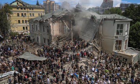 Rescuers work to clear the debris after a Russian missile strike on Okhmatdyt children’s hospital in Kyiv, 8 July 2024.